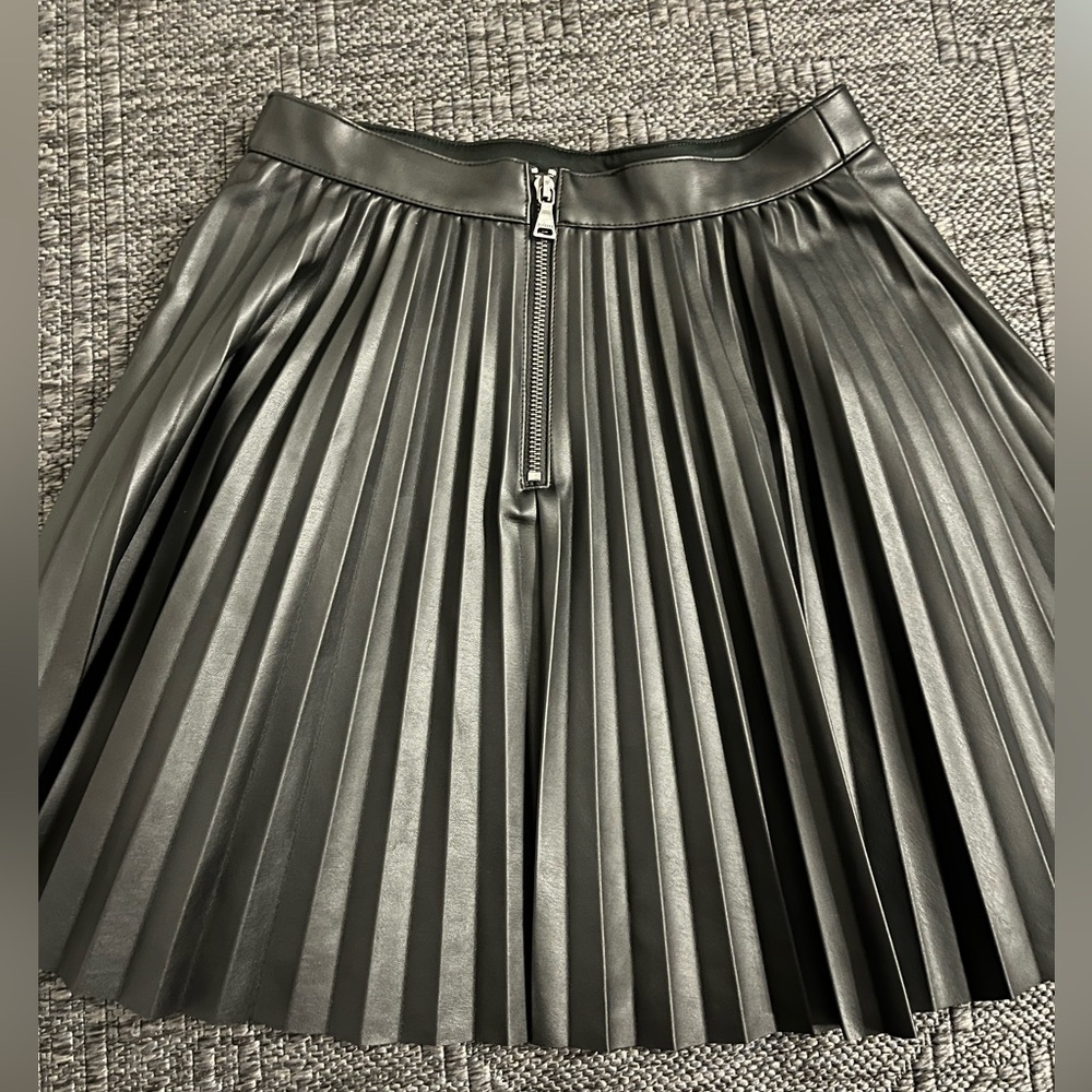 Express Black pleated faux leather skirt.